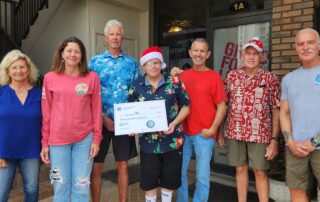 Surfing Santas of Cocoa Beach Gives Back