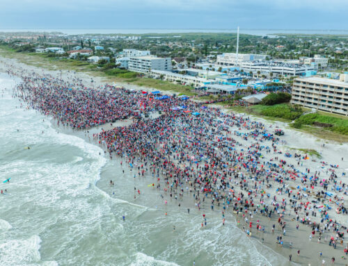 Surf’s up, Santa! Hundreds of festive surfers hit the Florida shore