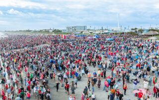 Record Breaking Crowds Attend 15th Annual Surfing Santas Event in Cocoa Beach