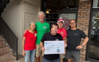 Surfing Santas of Cocoa Beach Donates ,000 to Grind for Life, Marking 15 Years of Support Surfing Santas of Cocoa Beach Donates ,000 to Grind for Life, Marking 15 Years of Support